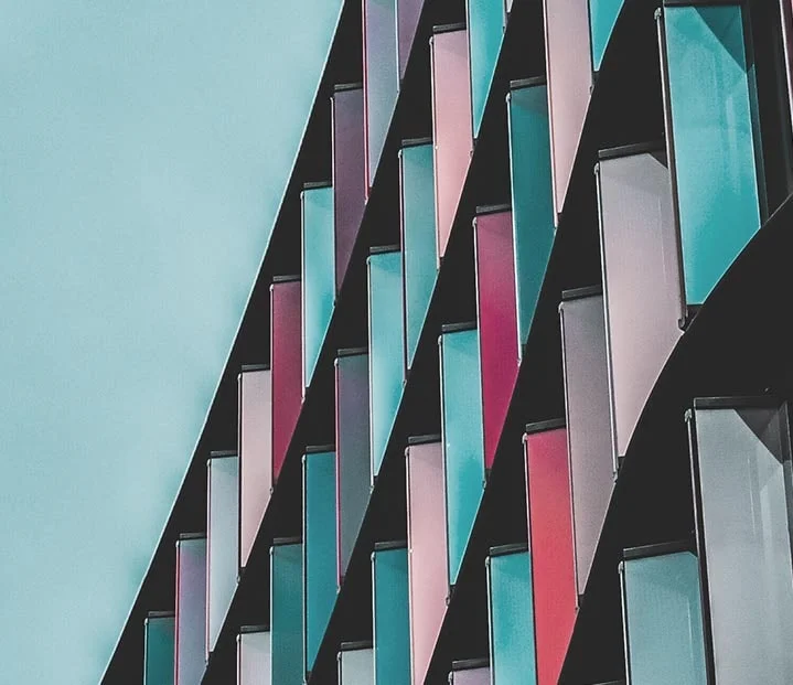 a wall full of different colored glass blocks process